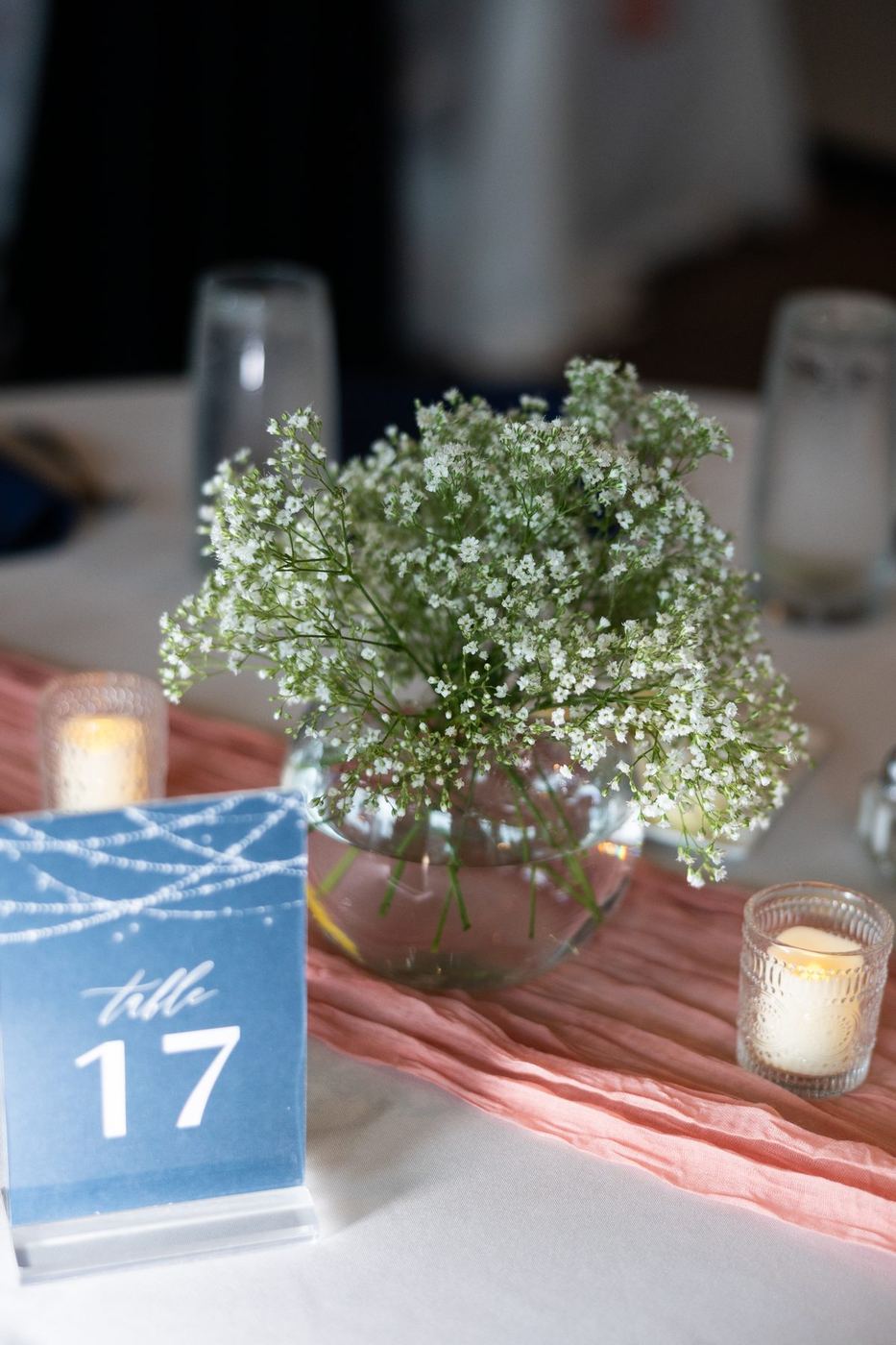 Table 17 card with baby's breath and votives